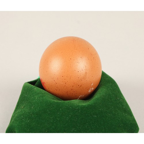 357 - An almost perfectly spherical chicken egg, purchased from a local supermarket. Round eggs are though... 