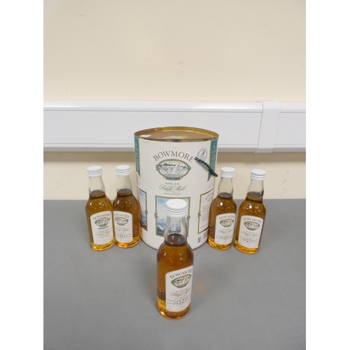 11 - Set of five bottles of Bowmore Islay Single Malt Scotch Whisky, 12, 15, 17 and 21 years old, and Leg... 