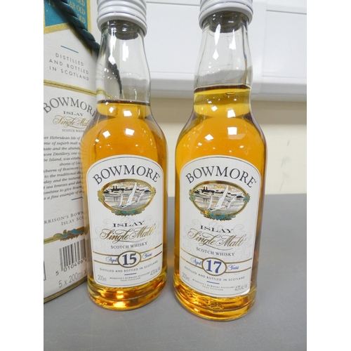 11 - Set of five bottles of Bowmore Islay Single Malt Scotch Whisky, 12, 15, 17 and 21 years old, and Leg... 