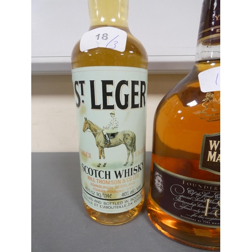 18 - Three bottles of Blended Scotch Whisky, Old bottle of St Leger, Distilled and Bottled by Hill Thomso... 