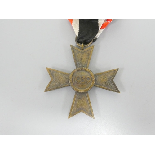 295 - Germany Third Reich: Awards to include War Merit Cross 1939, 2nd Class without Swords, and a War Mer... 