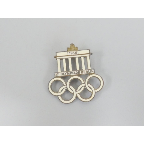 296 - Germany Third Reich. 1936 Berlin Olympics visitors badge. Steel base metal with gilt finish and infi... 