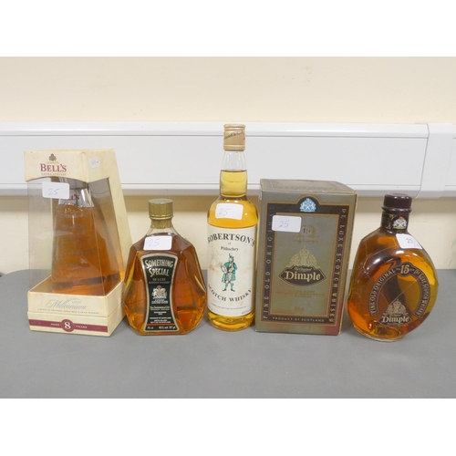 25 - Four bottles of Blended Scotch Whisky, Dimple 15 years old De Luxe, 75cl, 43% vol, boxed, Bell's Mil... 