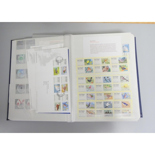 376 - Great Britain. An album of 2000s-2010s unfranked definitive postage stamps comprising of over 350 1s... 