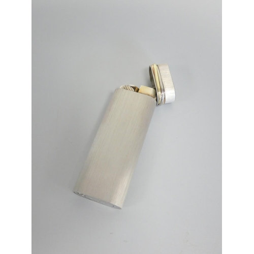 351 - Must de Cartier brushed steel and gold banded trilogy lighter serial number 96141V. Complete with bo... 