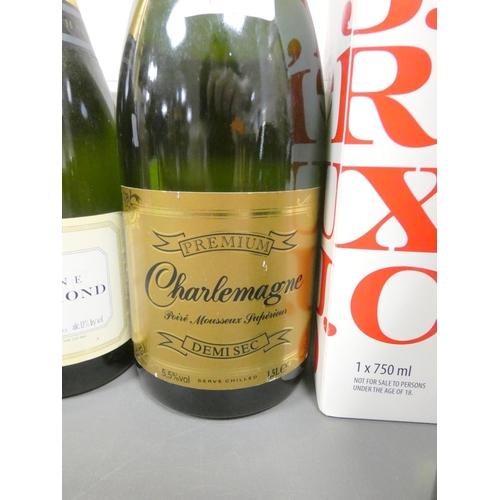 9 - Four bottles of Louis Raymond Brut Champagne, 75cl, 12% vol, with Charlemagne premium Demi Sec, 1.5 ... 