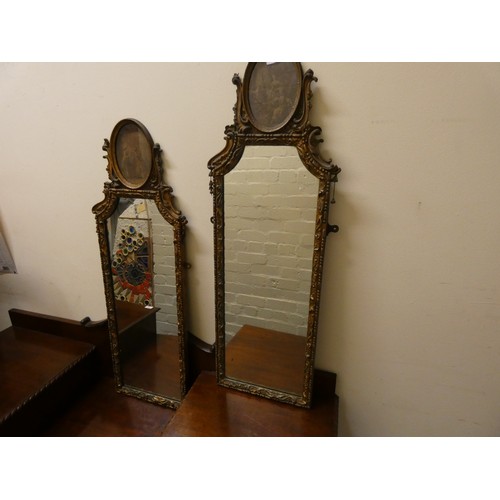 116A - Pair of 19th century Belle Epoque style giltwood pier mirrors, with oval print surmount above scroll... 