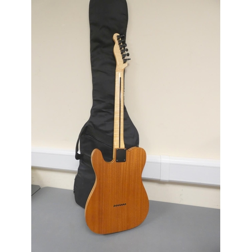 431 - Telecaster style six string electric guitar with pickups by Wilkinson, with carry bag.