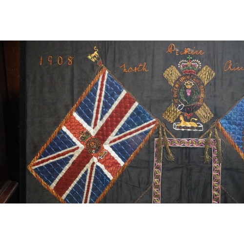 1770 - Framed needlework panel depicting The 79th Queens Own Cameron highlanders badge, crossed flags, drum... 