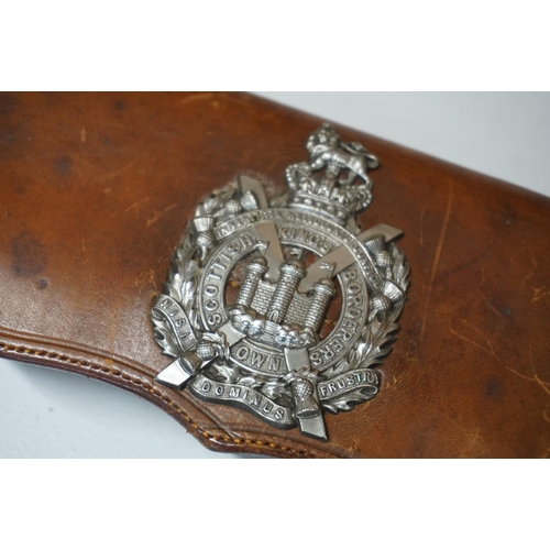 1772 - Two brown leather belt pouches with Kings Own Scottish Borderers cap badge and KOSB collar badge, on... 