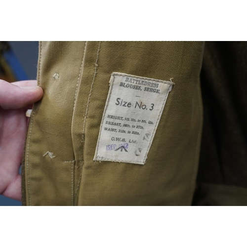 1778 - British army uniform, a WWII khaki green battledress blouse jacket, size 3, with OW8 Ltd label dated... 