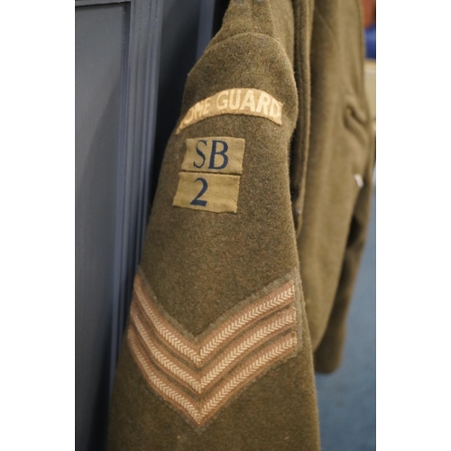 1781 - British army uniform, a WWII khaki green overcoat trenchcoat having J G Mason & Co interior labe... 