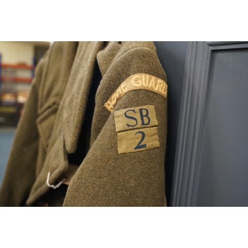 1781 - British army uniform, a WWII khaki green overcoat trenchcoat having J G Mason & Co interior labe... 