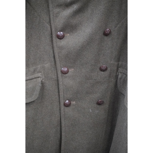 1782 - British army uniform, a WWII khaki green overcoat trenchcoat having plastic buttons, cloth Home Guar... 