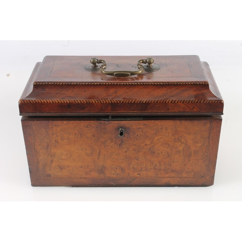 448 - 19th century walnut tea caddy of casket form with sarcophagus top opening to reveal three cannister ... 