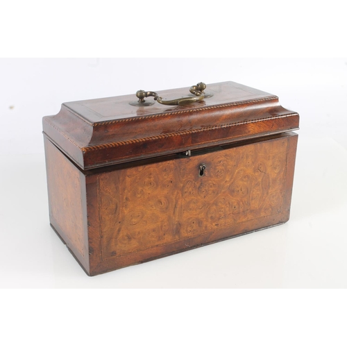 448 - 19th century walnut tea caddy of casket form with sarcophagus top opening to reveal three cannister ... 