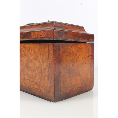 448 - 19th century walnut tea caddy of casket form with sarcophagus top opening to reveal three cannister ... 