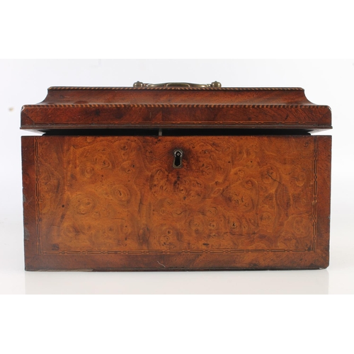 448 - 19th century walnut tea caddy of casket form with sarcophagus top opening to reveal three cannister ... 