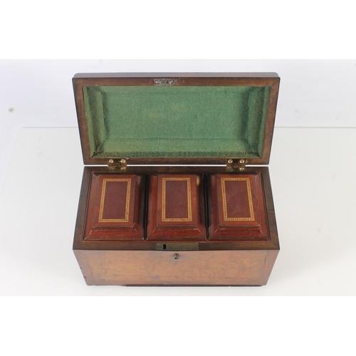 448 - 19th century walnut tea caddy of casket form with sarcophagus top opening to reveal three cannister ... 