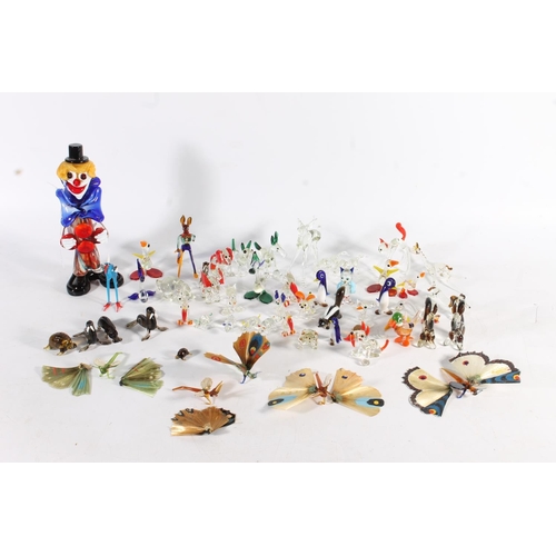 460 - Murano art glass clown and a group of Italian miniature glass animal models.