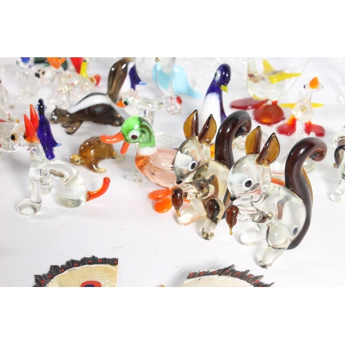 460 - Murano art glass clown and a group of Italian miniature glass animal models.