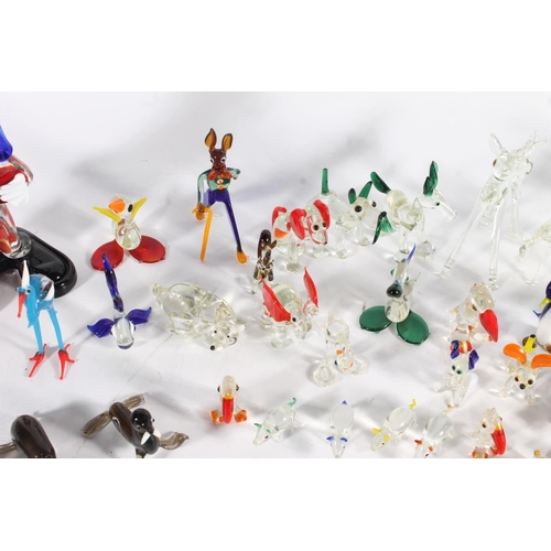 460 - Murano art glass clown and a group of Italian miniature glass animal models.