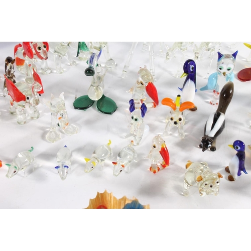 460 - Murano art glass clown and a group of Italian miniature glass animal models.