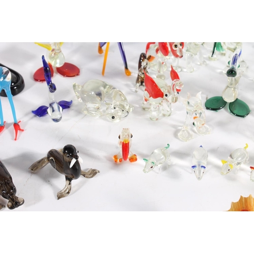 460 - Murano art glass clown and a group of Italian miniature glass animal models.