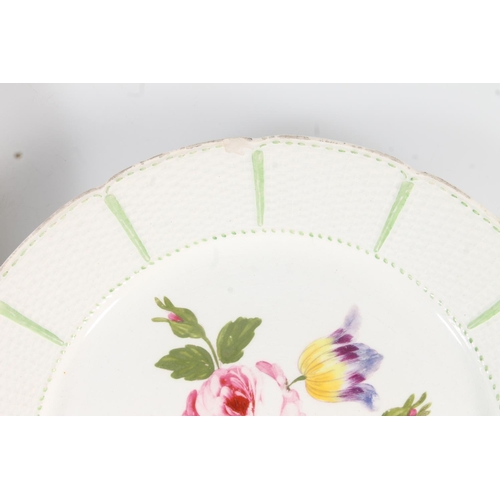 468 - Pair of Wedgwood plates with basket weave effect border framing central hand painted floral sprays, ... 