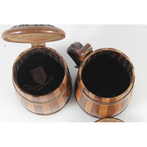 474 - Pair of Scandinavian style coopered wood peg style tankards, 11cm tall.