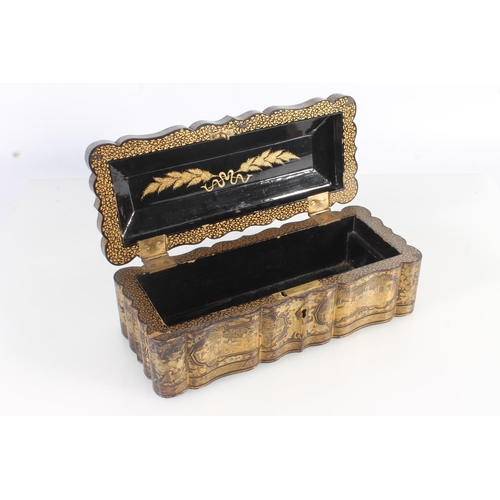 481 - Japanese lacquer glove box with serpentine edge.