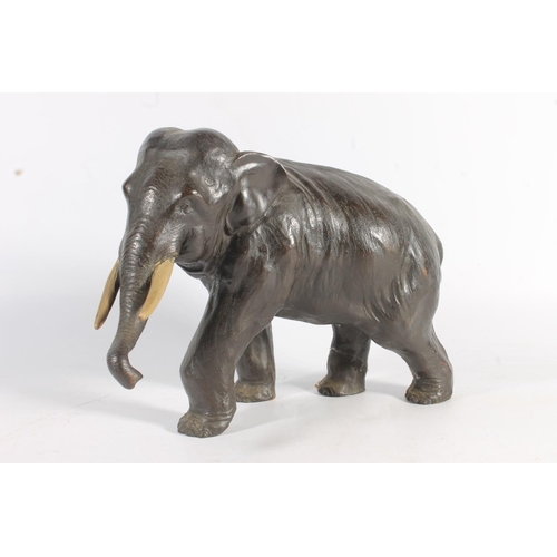 483 - Japanese bronze model of an elephant with two character mark to the base, 33cm long.