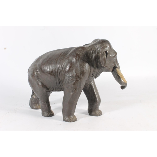 483 - Japanese bronze model of an elephant with two character mark to the base, 33cm long.