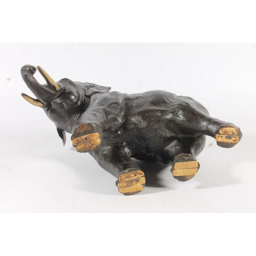 483 - Japanese bronze model of an elephant with two character mark to the base, 33cm long.