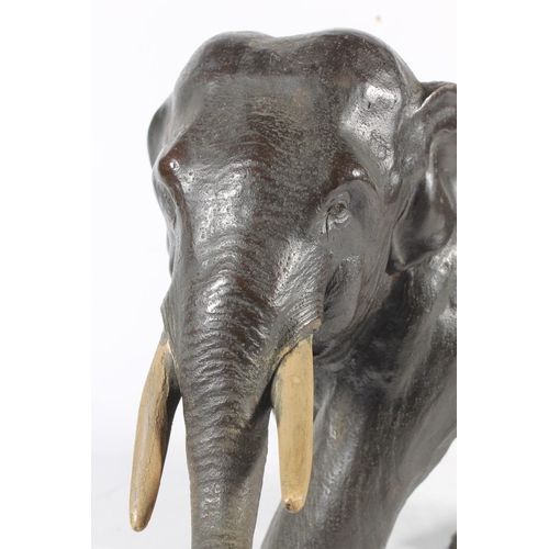 483 - Japanese bronze model of an elephant with two character mark to the base, 33cm long.