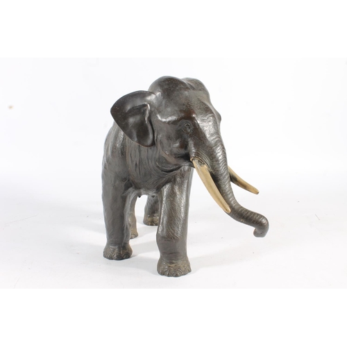 483 - Japanese bronze model of an elephant with two character mark to the base, 33cm long.