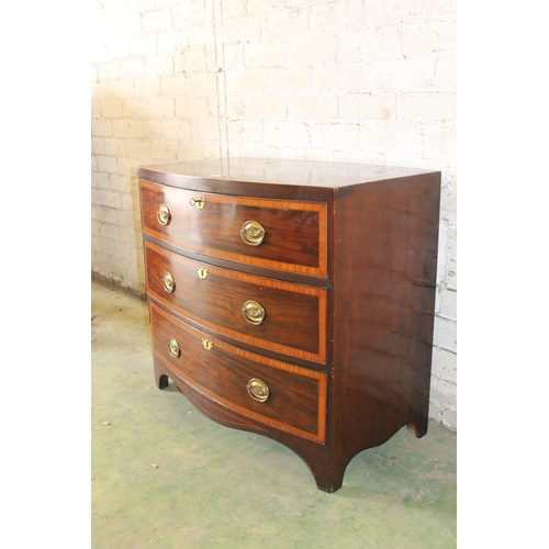 529 - Georgian flame mahogany and satinwood crossbanded bow front chest of drawers raised on bracket feet,... 