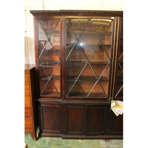 530 - Late Victorian mahogany breakfront four door library bookcase with astragal glazed cupboard doors ab... 