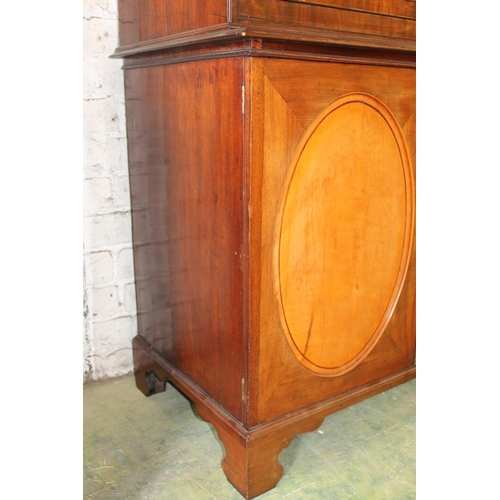 534 - 19th century mahogany and satinwood display cabinet, the arch top above two astragal glazed cupboard... 