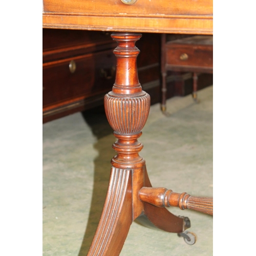 541 - Antique mahogany sofa table with two drop leafs, frieze drawers above trestle ends capped by brass f... 