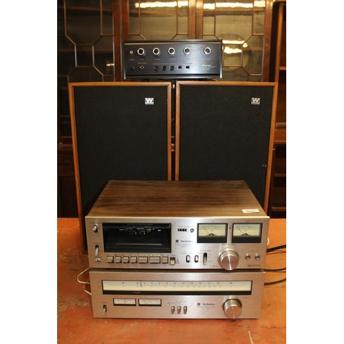 549 - Technics music centre and a pair of Wharfedale speakers.