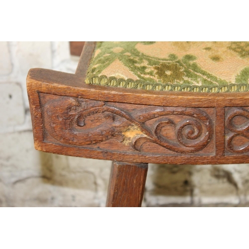 550 - Scottish Arts & Crafts style carved oak stool, 51cm long.