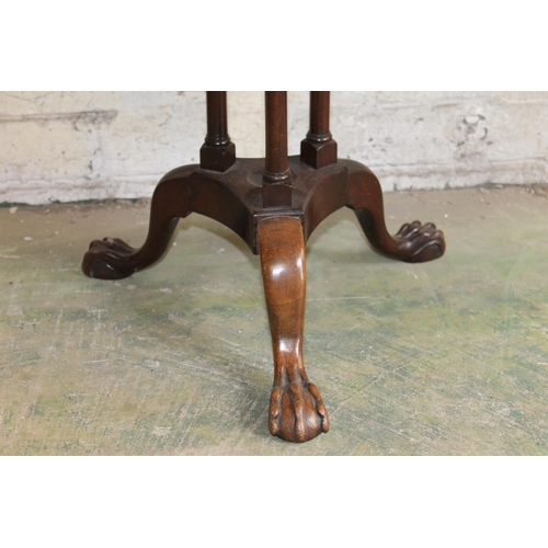 551 - Mahogany occasional table with piecrust edge raised on tripod base, 53cm diameter.