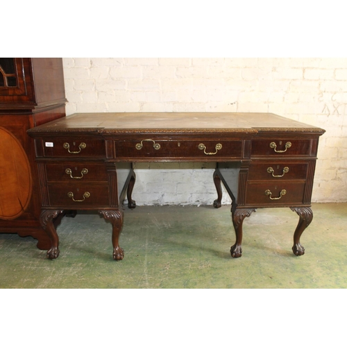 554 - 19th century mahogany breakfront desk, the top with inset brown leather skiver above carved moulded ... 