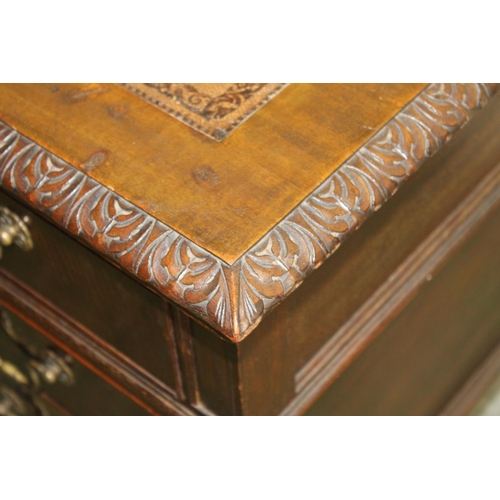 554 - 19th century mahogany breakfront desk, the top with inset brown leather skiver above carved moulded ... 