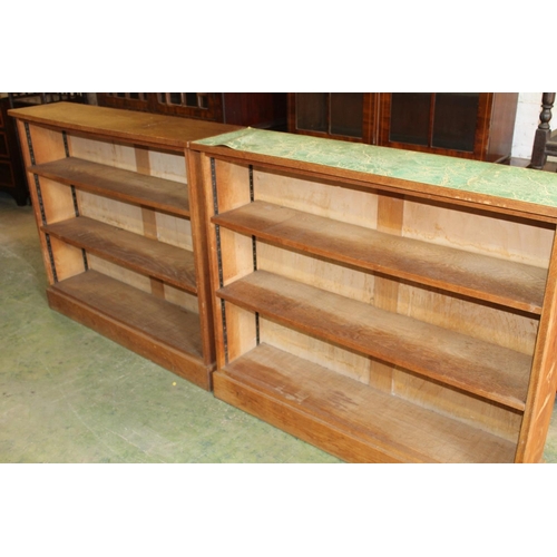 558 - Pair of oak open bookcases.