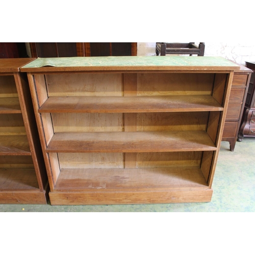 558 - Pair of oak open bookcases.