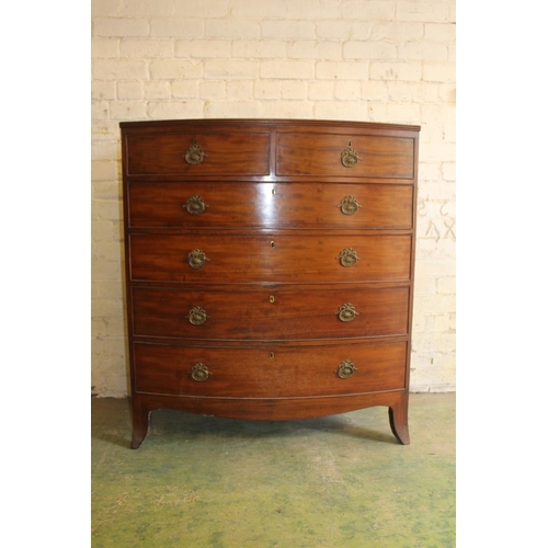 562 - Late Georgian mahogany bow front chest of drawers, the top with reeded edge over two short frieze dr... 