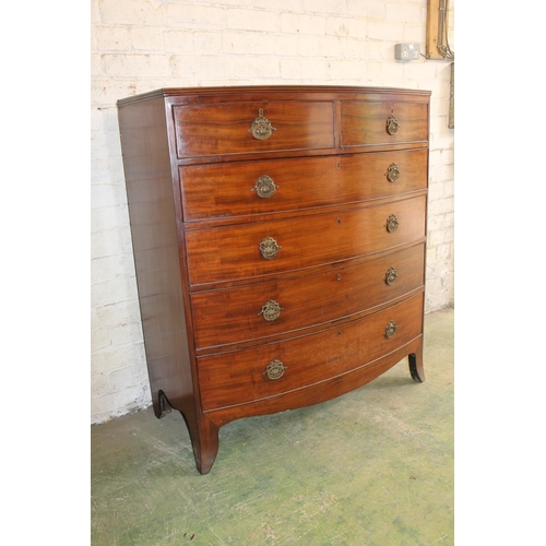 562 - Late Georgian mahogany bow front chest of drawers, the top with reeded edge over two short frieze dr... 