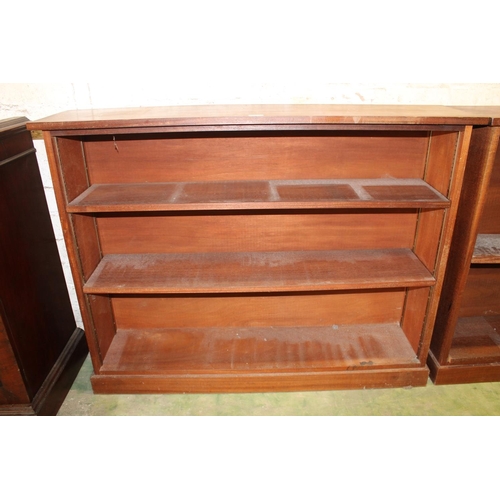 564 - Pair of mahogany open bookcases, 123cm long. (2)